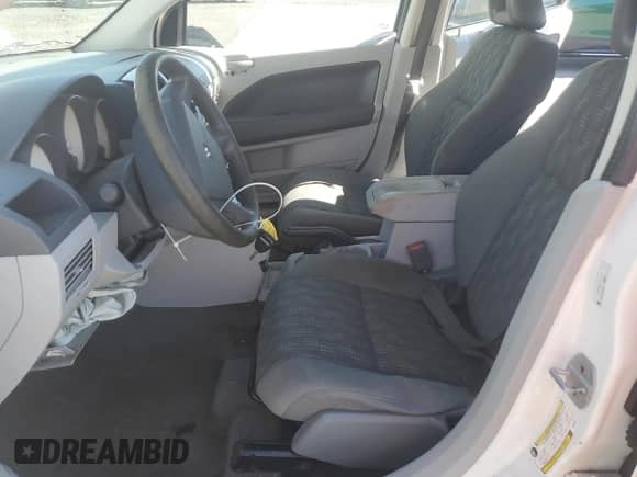 2007 Dodge Caliber with VIN 1B3HB28B07D534702, listed as a Copart auction lot 80118255 with 222,030 mi miles and Salvage title. Bid and sale history available at DreamBid. Image 7.