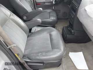 2001 Chevrolet Venture Warner Bros 1SE z VIN 1GNDX13E31D318125, wystawiony jako IAAI lot #42462648 z przebiegiem Nie podano mil oraz . Historia ofert i sprzedaży dostępna na DreamBid. Obrazek 5.