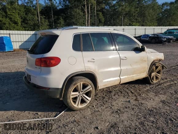 2014 Volkswagen Tiguan S with VIN WVGAV3AX2EW005381, listed as a Copart auction lot 70530225 with 130,540 mi miles and Salvage title. Bid and sale history available at DreamBid. Image 3.