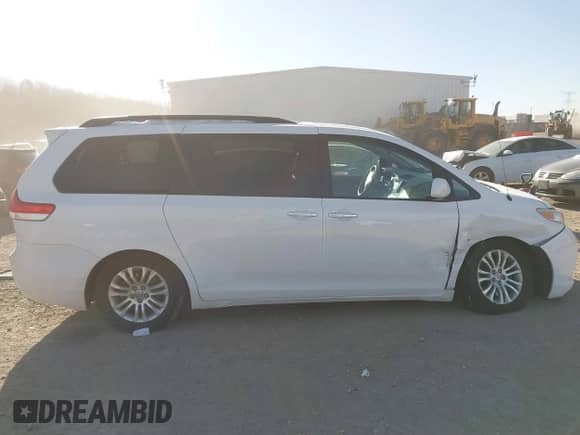 2013 Toyota Sienna XLE AAS with VIN 5TDYK3DC3DS308298, listed as a IAAI auction lot 41292280 with 165,638 mi miles and . Bid and sale history available at DreamBid. Image 13.