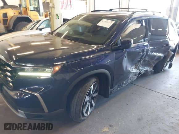 2023 Honda Pilot Touring с VIN 5FNYG1H72PB042624, выставлен на аукционе IAAI как лот 42860512 с пробегом 37 495 миль миль и . История ставок и продаж доступна на DreamBid. Изображение 6.