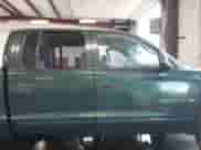 2001 Dodge Dakota Sport with VIN 1B7HG2AN31S318690, listed as a IAAI auction lot 42766545 with 212,865 mi miles and . Bid and sale history available at DreamBid. Image 13.