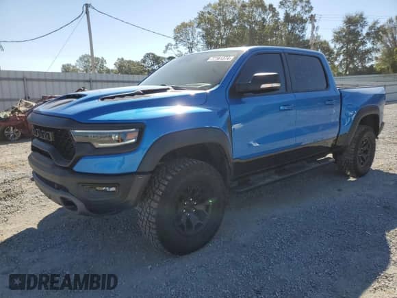 2022 Ram 1500 TRX with VIN 1C6SRFU93NN229879, listed as a Copart auction lot 77161374 with 7,836 mi miles and Salvage title. Bid and sale history available at DreamBid. Image 1.