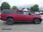 2010 Chevrolet Suburban LT z VIN 1GNUKJE31AR129860, wystawiony jako IAAI lot #42376828 z przebiegiem Nie podano mil oraz . Historia ofert i sprzedaży dostępna na DreamBid. Obrazek 12.