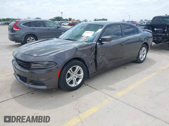 2019 Dodge Charger SXT with VIN 2C3CDXBG7KH707734, listed as a IAAI auction lot 42659110 with 68,600 mi miles and . Bid and sale history available at DreamBid. Image 2.