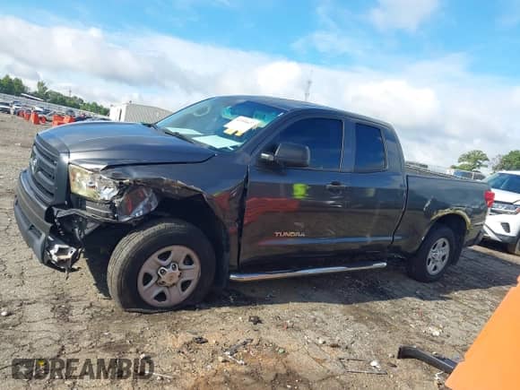2012 Toyota Tundra z VIN 5TFRU5F14CX026640, wystawiony jako IAAI lot #42994627 z przebiegiem 310 619 mil mil oraz . Historia ofert i sprzedaży dostępna na DreamBid. Obrazek 14.