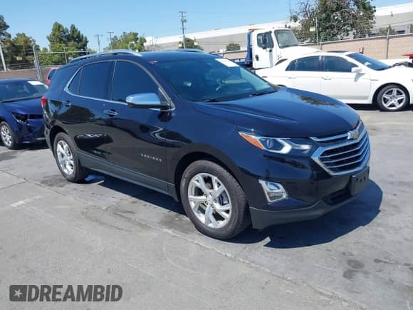 2020 Chevrolet Equinox Premier z VIN 2GNAXXEV2L6196670, wystawiony jako IAAI lot #42640318 z przebiegiem 52 343 mil mil oraz . Historia ofert i sprzedaży dostępna na DreamBid. Obrazek 1.