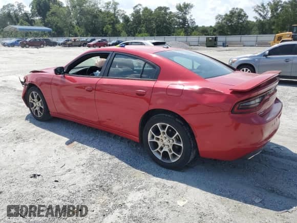 2015 Dodge Charger SE with VIN 2C3CDXFG6FH827847, listed as a Copart auction lot 67397055 with 132,471 mi miles and Salvage title. Bid and sale history available at DreamBid. Image 2.