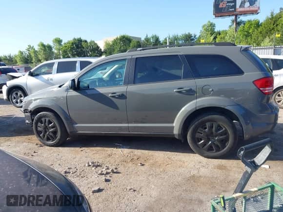 2020 Dodge Journey SE Value with VIN 3C4PDCAB9LT251028, listed as a IAAI auction lot 42846141 with 71,924 mi miles and . Bid and sale history available at DreamBid. Image 3.