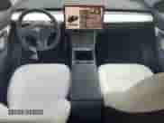 2022 Tesla Model Y Long Range with VIN 7SAYGDEE9NF455340, listed as a Copart auction lot 66966654 with 22,707 mi miles and Salvage title. Bid and sale history available at DreamBid. Image 8.