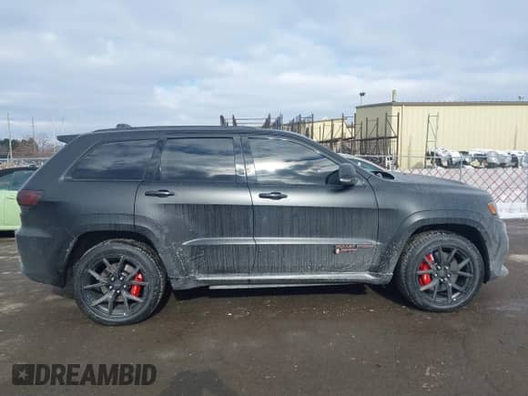 2021 Jeep Grand Cherokee SRT with VIN 1C4RJFDJ7MC559608, listed as a IAAI auction lot 41379028 with 18,464 mi miles and . Bid and sale history available at DreamBid. Image 13.