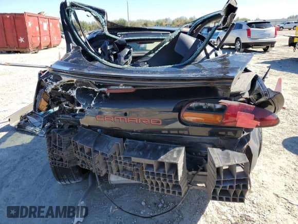 2002 Chevrolet Camaro z VIN 2G1FP22K222145258, wystawiony jako Copart lot #42644965 z przebiegiem Nie podano mil oraz Szkoda całkowita • Salvage title. Historia ofert i sprzedaży dostępna na DreamBid. Obrazek 6.