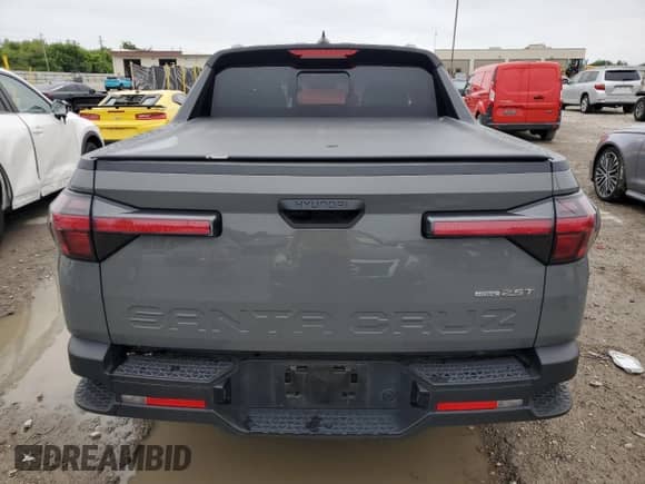 2022 Hyundai Santa Cruz SEL Premium с VIN 5NTJDDAF1NH005206, выставлен на аукционе Copart как лот 67299175 с пробегом 65 834 миль миль и Списание • Salvage title. История ставок и продаж доступна на DreamBid. Изображение 6.