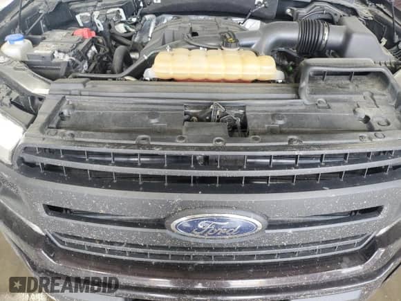 2018 Ford F-150 XLT z VIN 1FTEW1EP3JKC98808, wystawiony jako Copart lot #63217945 z przebiegiem 83 102 mil mil oraz Szkoda całkowita • Salvage title. Historia ofert i sprzedaży dostępna na DreamBid. Obrazek 11.