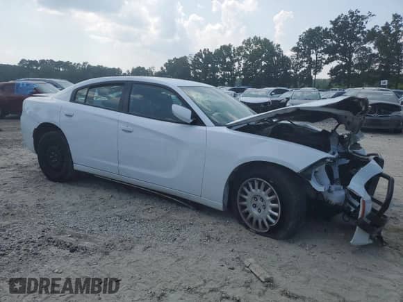 2021 Dodge Charger Police with VIN 2C3CDXKG7MH657260, listed as a Copart auction lot 60485215 with Not provided miles and Salvage title. Bid and sale history available at DreamBid. Image 4.