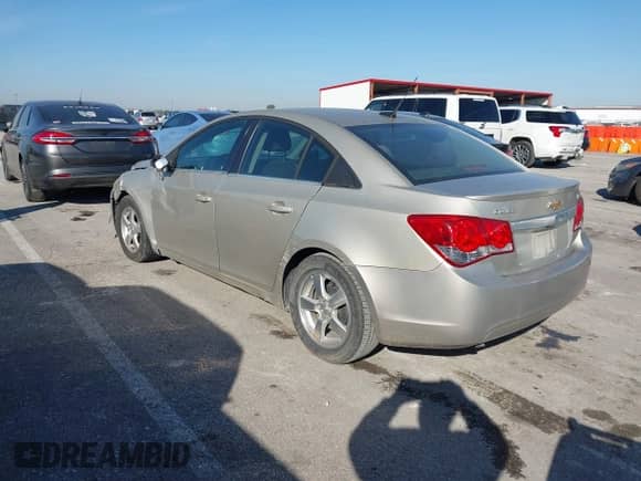 2014 Chevrolet Cruze 1LT z VIN 1G1PC5SB5E7341841, wystawiony jako IAAI lot #43574877 z przebiegiem 113 006 mil mil oraz . Historia ofert i sprzedaży dostępna na DreamBid. Obrazek 3.