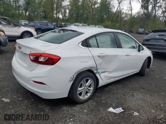 2017 Chevrolet Cruze LT z VIN 1G1BE5SM6H7215949, wystawiony jako Copart lot #81203235 z przebiegiem 31 864 mil mil oraz Szkoda całkowita • Salvage title. Historia ofert i sprzedaży dostępna na DreamBid. Obrazek 3.