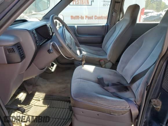 1992 Dodge Caravan with VIN 2B4GH2535NR705117, listed as a Copart auction lot 77091264 with 174,008 mi miles and Salvage title. Bid and sale history available at DreamBid. Image 7.