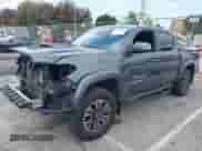2022 Toyota Tacoma SR z VIN 3TMCZ5AN6NM491351, wystawiony jako IAAI lot #42140198 z przebiegiem 33 051 mil mil oraz . Historia ofert i sprzedaży dostępna na DreamBid. Obrazek 2.