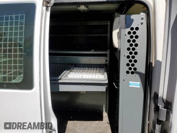 2013 Chevrolet Express Cargo с VIN 1GCWGFCA7D1903050, выставлен на аукционе Copart как лот 63351075 с пробегом 158 004 миль миль и Чистый • Clean title. История ставок и продаж доступна на DreamBid. Изображение 11.