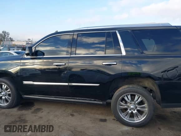 2018 Cadillac Escalade Platinum with VIN 1GYS4DKJ3JR200016, listed as a IAAI auction lot 41367220 with 105,043 mi miles and . Bid and sale history available at DreamBid. Image 14.
