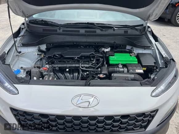2022 Hyundai Kona SE z VIN KM8K2CAB1NU792305, wystawiony jako Copart lot #68504145 z przebiegiem 57 692 mil mil oraz Czysty tytuł • Clean title. Historia ofert i sprzedaży dostępna na DreamBid. Obrazek 7.
