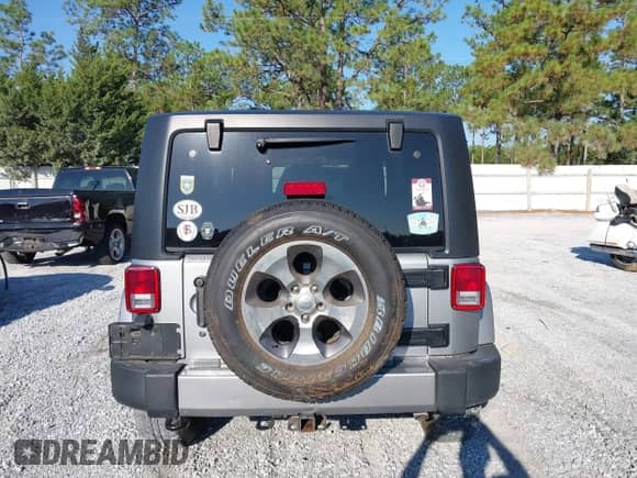 2018 Jeep Wrangler Sahara with VIN 1C4AJWBG5JL895550, listed as a IAAI auction lot 43303531 with 39,755 mi miles and . Bid and sale history available at DreamBid. Image 16.