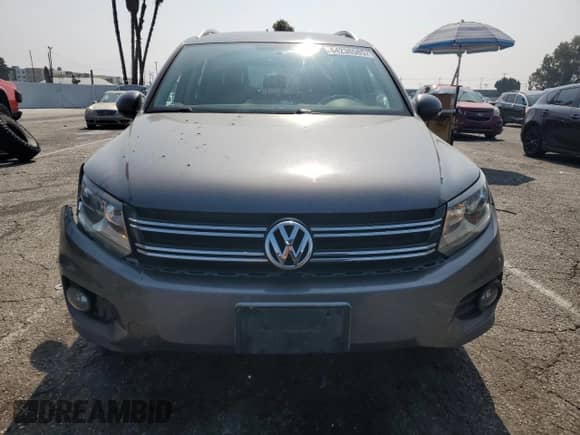 2013 Volkswagen Tiguan SE z VIN WVGAV3AXXDW606925, wystawiony jako Copart lot #64238585 z przebiegiem 131 779 mil mil oraz Szkoda całkowita • Salvage title. Historia ofert i sprzedaży dostępna na DreamBid. Obrazek 5.
