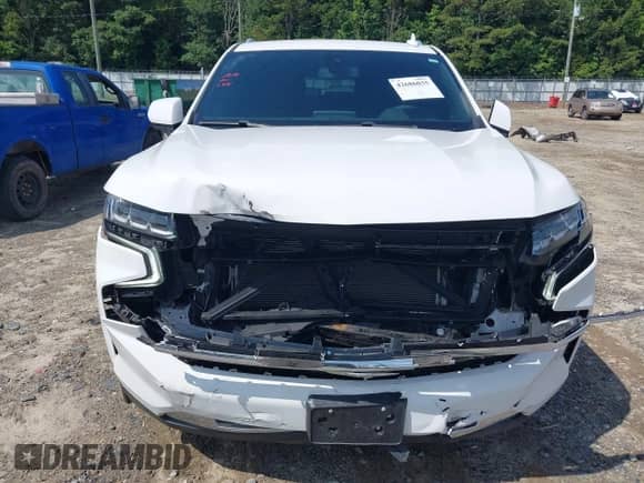 2021 Chevrolet Tahoe LT z VIN 1GNSKNKD8MR376759, wystawiony jako IAAI lot #42686035 z przebiegiem 41 568 mil mil oraz . Historia ofert i sprzedaży dostępna na DreamBid. Obrazek 6.