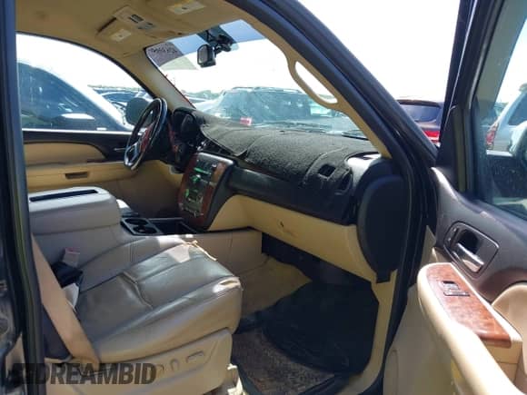 2008 Chevrolet Suburban LTZ with VIN 1GNFC16028R258324, listed as a IAAI auction lot 42630059 with 180,236 mi miles and . Bid and sale history available at DreamBid. Image 5.