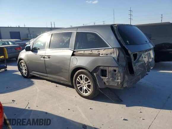 2012 Honda Odyssey EX z VIN 5FNRL5H41CB120012, wystawiony jako Copart lot #87036855 z przebiegiem 120 980 mil mil oraz Szkoda całkowita • Salvage title. Historia ofert i sprzedaży dostępna na DreamBid. Obrazek 2.