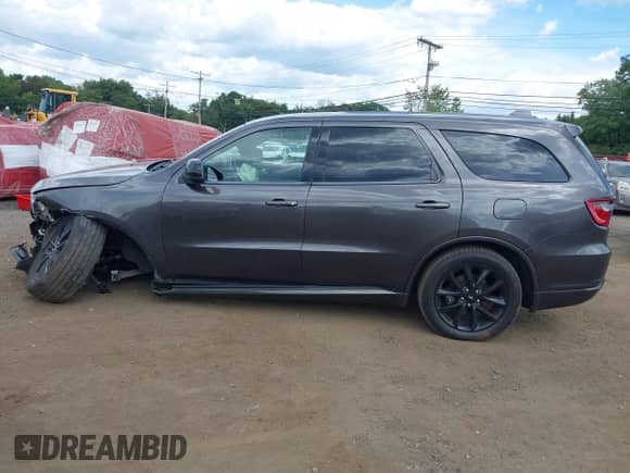 2019 Dodge Durango SXT with VIN 1C4RDJAG2KC599580, listed as a IAAI auction lot 43104403 with 108,136 mi miles and . Bid and sale history available at DreamBid. Image 14.