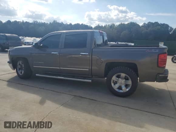 2014 Chevrolet Silverado 1500 LTZ with VIN 3GCUKSECXEG229539, listed as a Copart auction lot 81272235 with 236,690 mi miles and Salvage title. Bid and sale history available at DreamBid. Image 2.