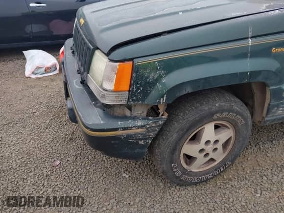 1993 Jeep Grand Cherokee Limited z VIN 1J4GZ78S1PC525798, wystawiony jako IAAI lot #42572328 z przebiegiem 197 551 mil mil oraz . Historia ofert i sprzedaży dostępna na DreamBid. Obrazek 6.