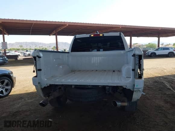 2021 Ram 1500 Lone Star z VIN 1C6RREFT4MN609345, wystawiony jako IAAI lot #42737182 z przebiegiem 109 604 mil mil oraz . Historia ofert i sprzedaży dostępna na DreamBid. Obrazek 6.