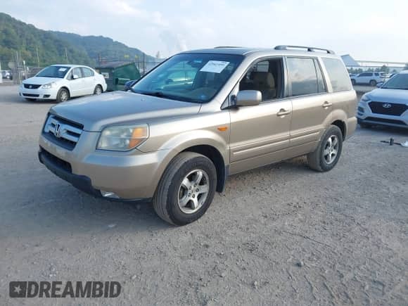 2006 Honda Pilot EX-L z VIN 2HKYF18686H558853, wystawiony jako IAAI lot #42941099 z przebiegiem 274 418 mil mil oraz . Historia ofert i sprzedaży dostępna na DreamBid. Obrazek 2.