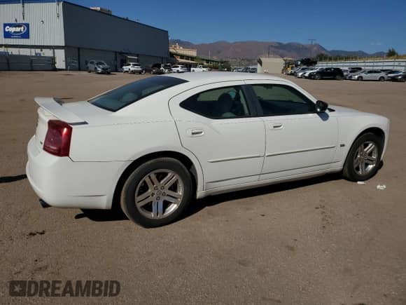 2006 Dodge Charger z VIN 2B3KA43G46H324046, wystawiony jako Copart lot #75922634 z przebiegiem 192 337 mil mil oraz Czysty tytuł • Clean title. Historia ofert i sprzedaży dostępna na DreamBid. Obrazek 3.