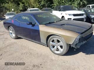 2013 Dodge Challenger R/T Plus z VIN 2C3CDYBT0DH741973, wystawiony jako IAAI lot #43424872 z przebiegiem 83 653 mil mil oraz . Historia ofert i sprzedaży dostępna na DreamBid. Obrazek 1.