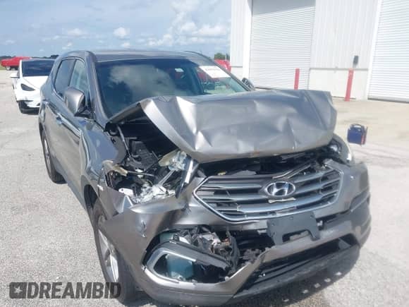 2018 Hyundai Santa Fe 2.4L with VIN 5NMZT3LB0JH053313, listed as a IAAI auction lot 42992926 with 140,803 mi miles and . Bid and sale history available at DreamBid. Image 6.