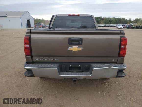 2014 Chevrolet Silverado 1500 LT с VIN 1GCRCREH1EZ145715, выставлен на аукционе Copart как лот 82517325 с пробегом 245 253 миль миль и Списание • Salvage title. История ставок и продаж доступна на DreamBid. Изображение 6.