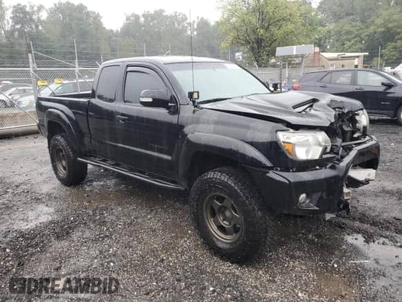 2015 Toyota Tacoma с VIN 5TFUU4EN3FX142375, выставлен на аукционе Copart как лот 81690545 с пробегом 94 403 миль миль и Списание • Salvage title. История ставок и продаж доступна на DreamBid. Изображение 4.