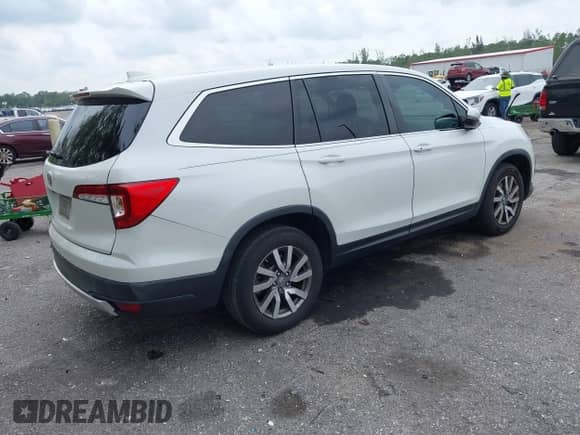 2021 Honda Pilot EX-L z VIN 5FNYF5H58MB027498, wystawiony jako IAAI lot #42404177 z przebiegiem 89 665 mil mil oraz . Historia ofert i sprzedaży dostępna na DreamBid. Obrazek 4.