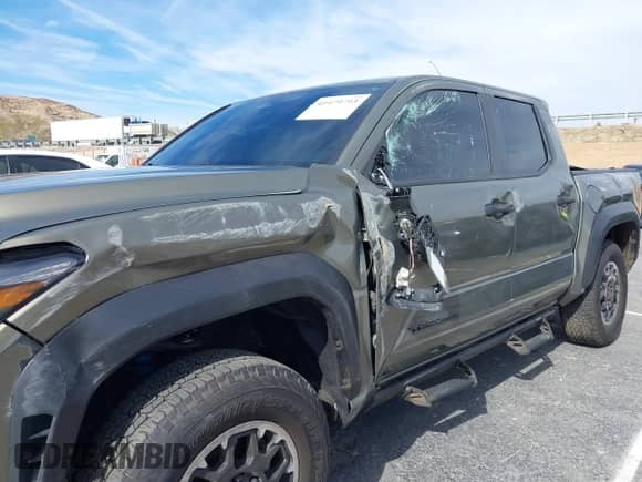 2024 Toyota Tacoma SR5 with VIN 3TMLB5JN6RM027745, listed as a IAAI auction lot 41479793 with 16,376 mi miles and . Bid and sale history available at DreamBid. Image 17.