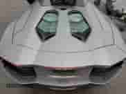 2014 Lamborghini Aventador с VIN ZHWUR1ZD6ELA03035, выставлен на аукционе Copart как лот 66784084 с пробегом 23 771 миль миль и Списание • Salvage title. История ставок и продаж доступна на DreamBid. Изображение 12.