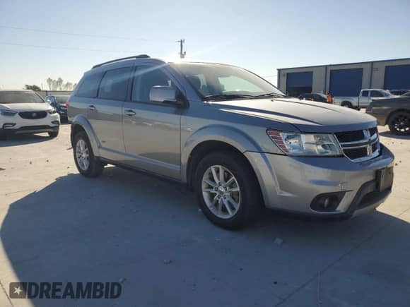 2016 Dodge Journey SXT with VIN 3C4PDCBG7GT202670, listed as a Copart auction lot 82617005 with 163,106 mi miles and Salvage title. Bid and sale history available at DreamBid. Image 4.