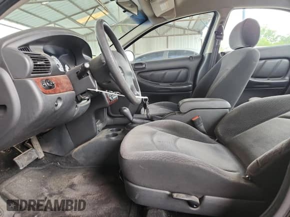 2002 Dodge Stratus SE z VIN 1B3EL36R02N198011, wystawiony jako Copart lot #58213505 z przebiegiem 104 464 mil mil oraz Czysty tytuł • Clean title. Historia ofert i sprzedaży dostępna na DreamBid. Obrazek 7.