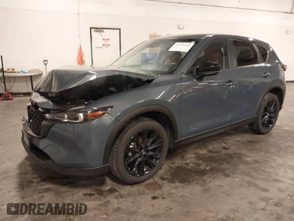2023 Mazda CX-5 S Carbon Edition z VIN JM3KFBCM1P0238345, wystawiony jako IAAI lot #42799769 z przebiegiem 53 614 mil mil oraz . Historia ofert i sprzedaży dostępna na DreamBid. Obrazek 19.