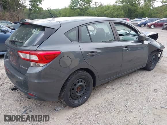 2018 Subaru Impreza z VIN 4S3GTAA67J3743592, wystawiony jako IAAI lot #42830094 z przebiegiem 179 650 mil mil oraz . Historia ofert i sprzedaży dostępna na DreamBid. Obrazek 4.