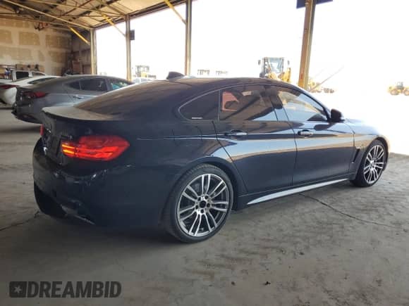 2015 BMW 4 Series 428i with VIN WBA4A9C54FGL86784, listed as a Copart auction lot 64073315 with 73,337 mi miles and Salvage title. Bid and sale history available at DreamBid. Image 3.
