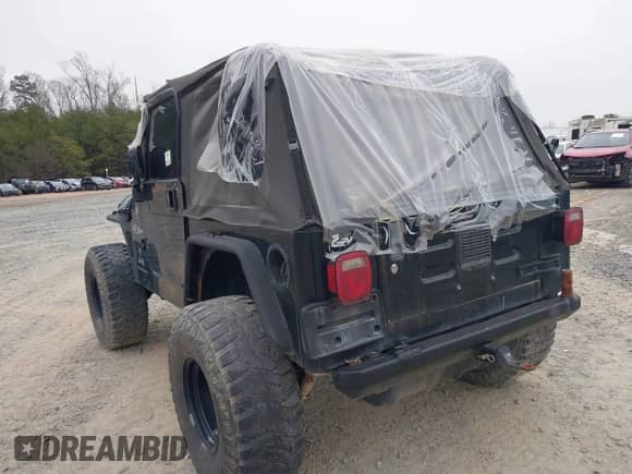 2003 Jeep Wrangler X with VIN 1J4FA39S33P375741, listed as a IAAI auction lot 40858427 with Not provided miles and . Bid and sale history available at DreamBid. Image 3.